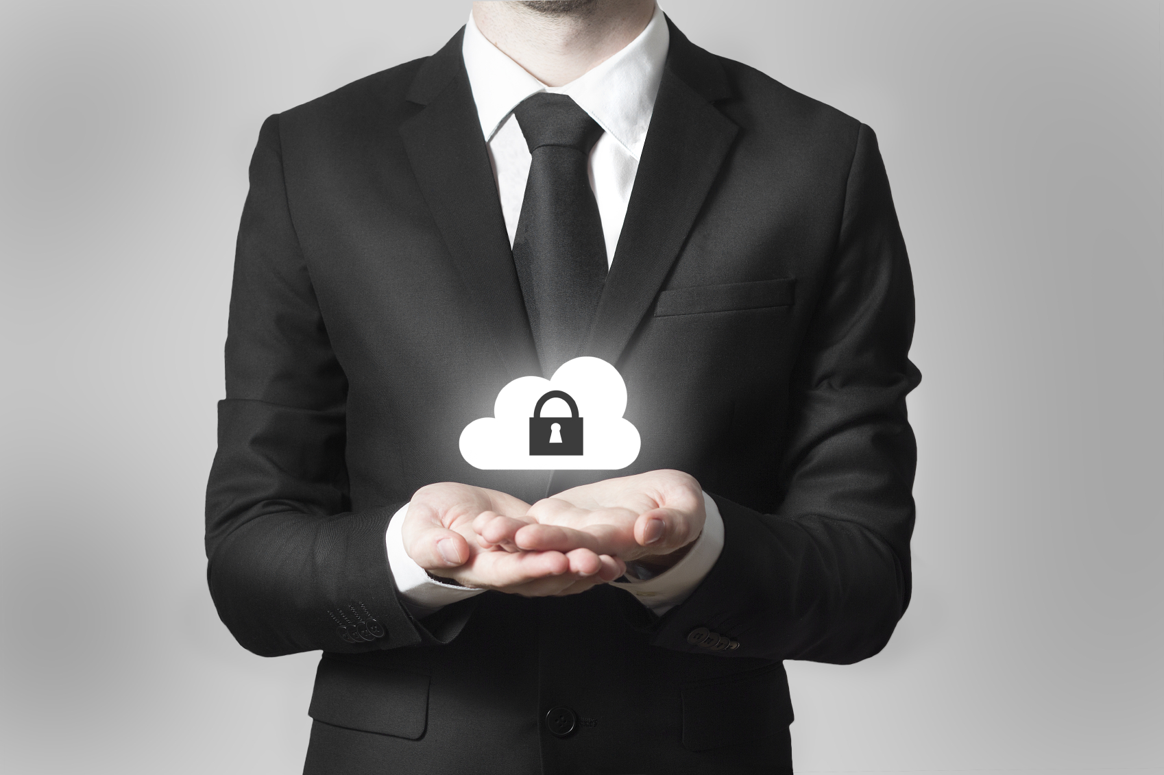 businessman in black suit serving gesture cloud security symbol